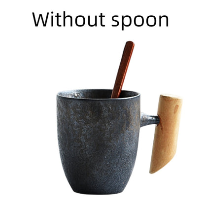 Handmade coarse pottery mug with spoon